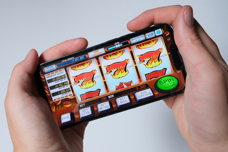 Seseorang bermain slot melalui ponsel — pengalaman mobile Pandora88
